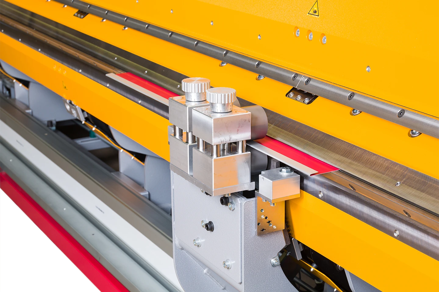 omslags- och rullformningsmodul på en thalmann långbockare mot vit bakgrund